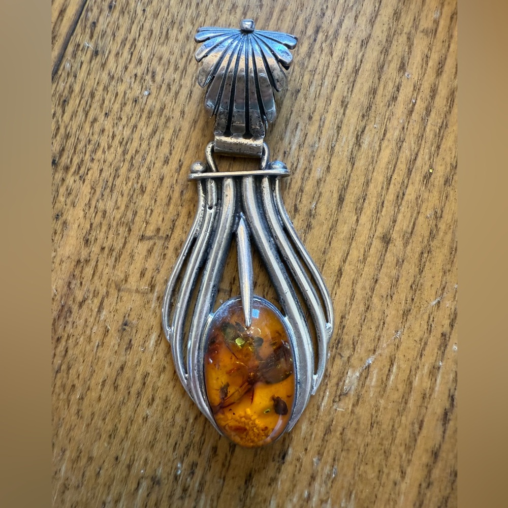 Elegant Silver and Amber Pendant Necklace